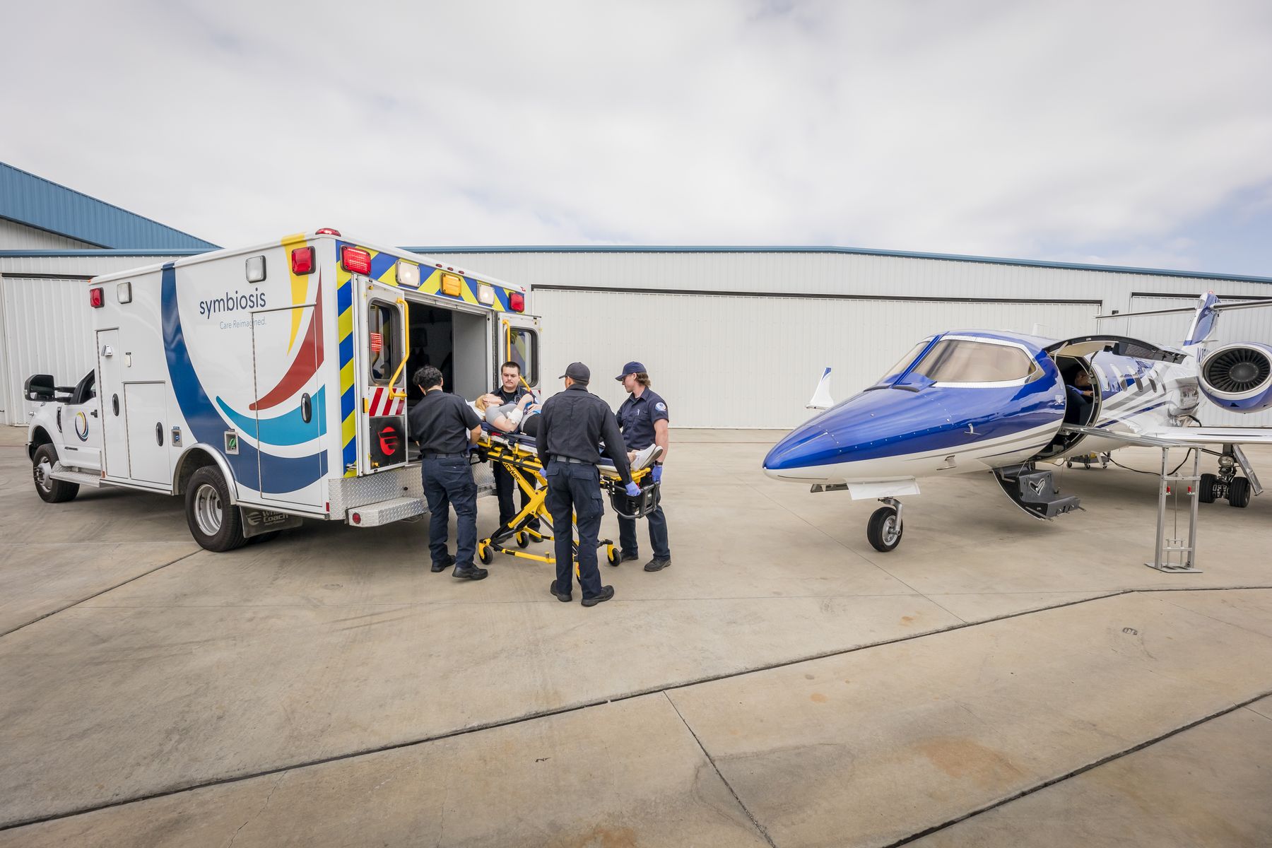 Symbiosis ground ambulance and fixed-wing air ambulance together during a critical care patient transfer