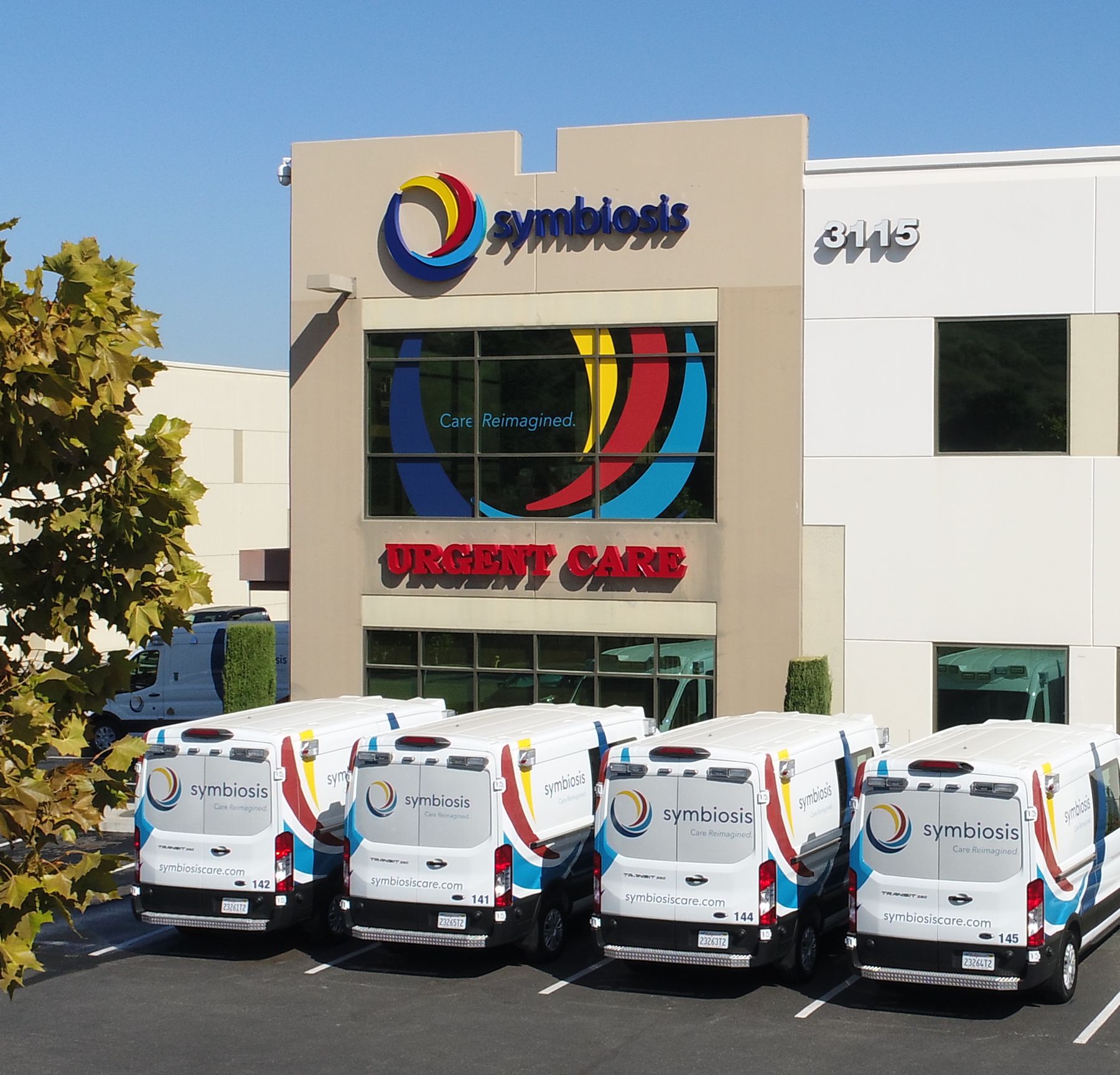 Symbiosis ambulance fleet lined up outside Urgent Care headquarters