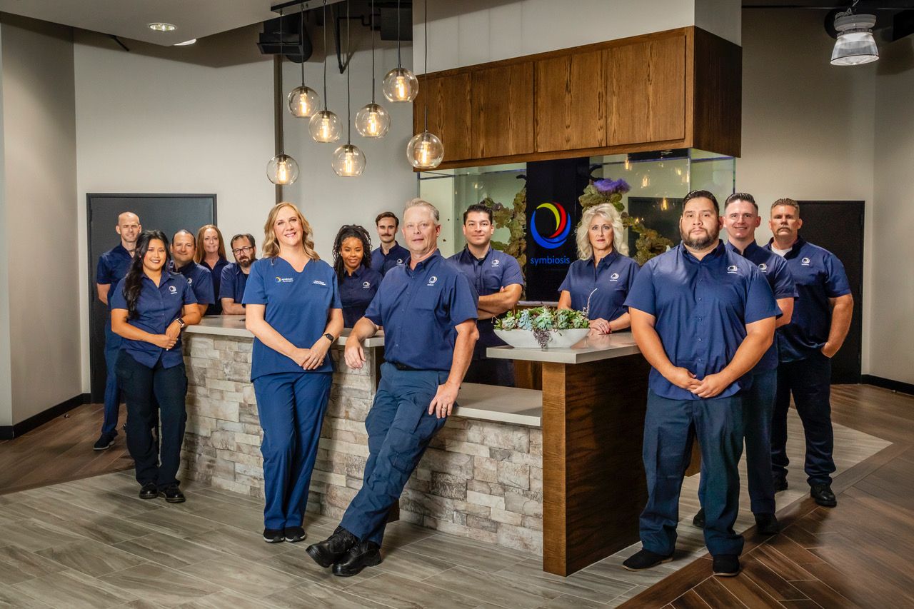 Symbiosis team members at the headquarters lobby